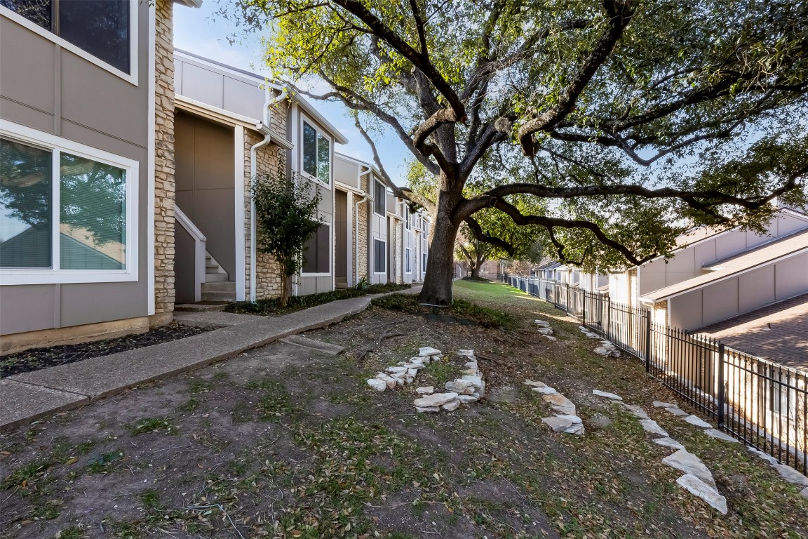 1740 Timber Ridge Road, Unit 136 Austin, TX 78741 - Photo 6 of 32 View of yard with a residential view