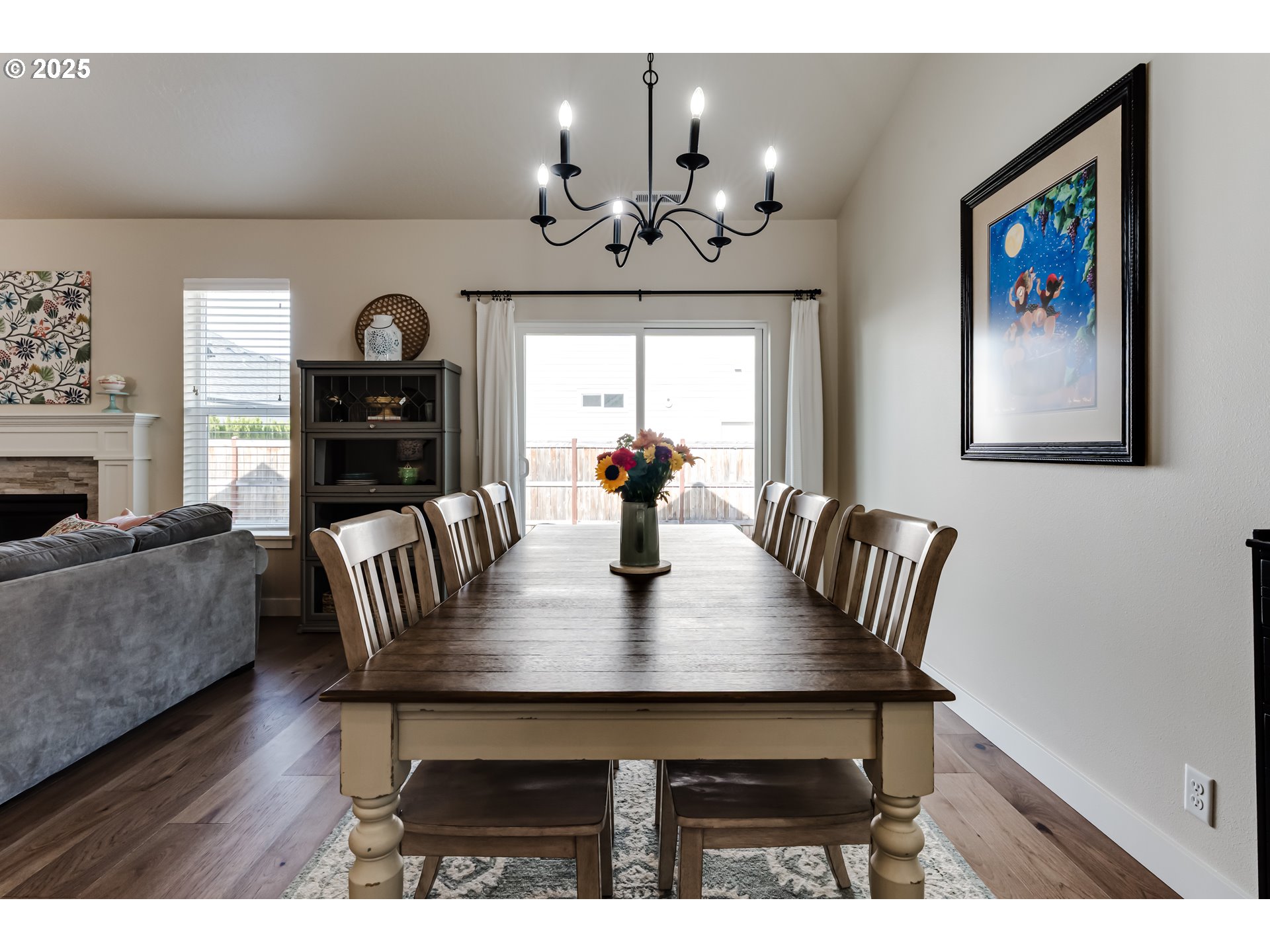 3266 Mountain Crk Lane Springfield, OR 97478 - Photo 15 of 42 a view of a dining room with furniture wooden floor and chandelier