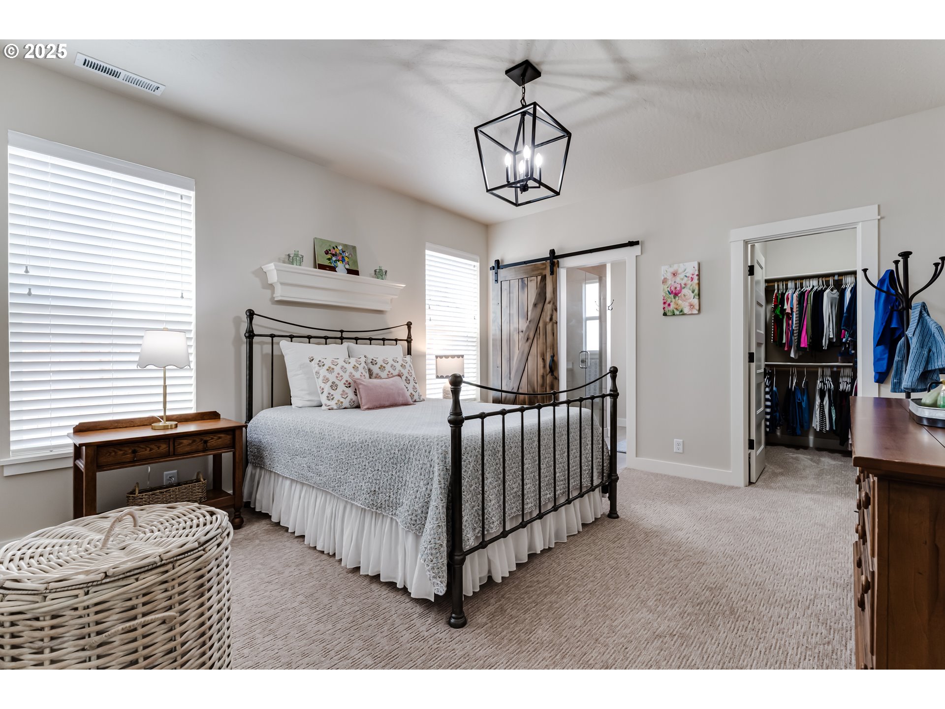 3266 Mountain Crk Lane Springfield, OR 97478 - Photo 22 of 42 a bedroom with a bed and a chandelier