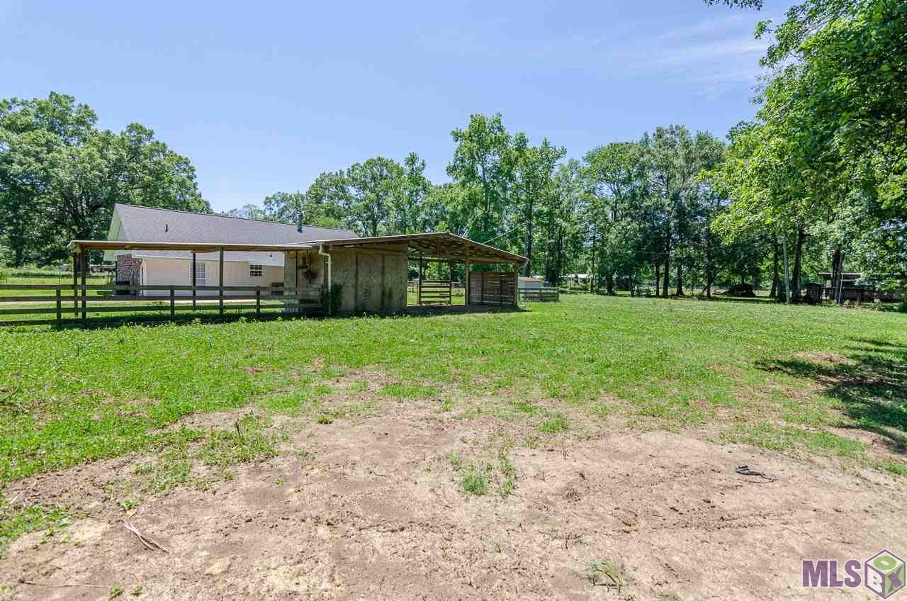 17130 Charlie Brown Road Prairieville, LA 70769 - Photo 9 of 29 View of home and barn from back pasture