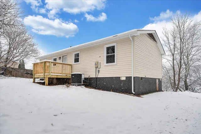 a view of a snow on the road