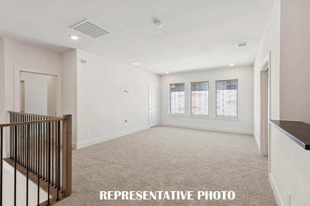 3909 Launch Road McKinney, TX 75071 - Photo 13 of 17 a view of an empty room with a window