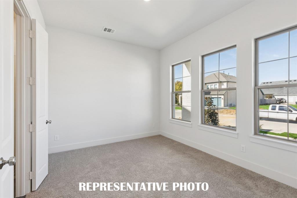 3909 Launch Road McKinney, TX 75071 - Photo 15 of 17 a view of an empty room with a window