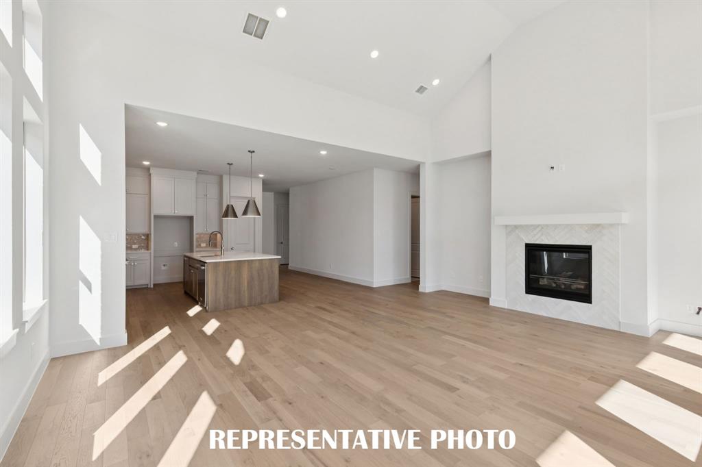 3909 Launch Road McKinney, TX 75071 - Photo 7 of 17 a view of a kitchen with a sink