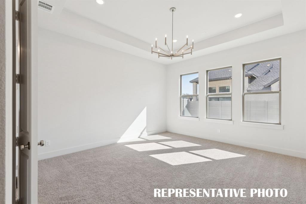 3909 Launch Road McKinney, TX 75071 - Photo 9 of 17 a view of an empty room with a window