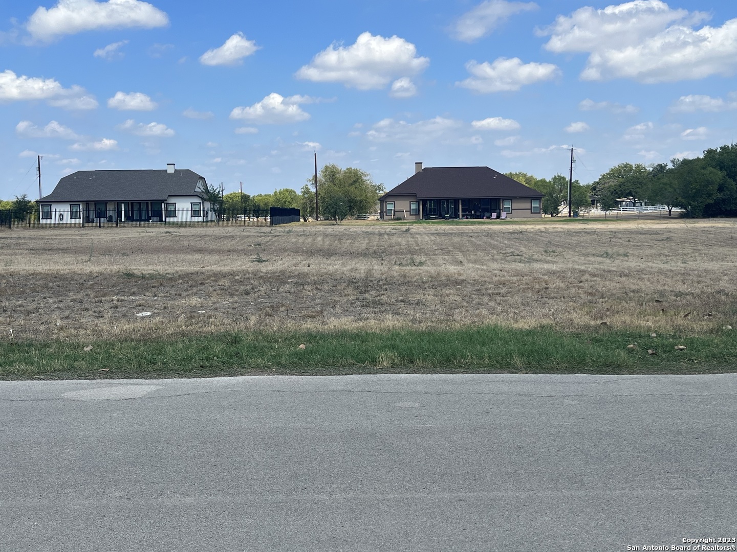 0 Viewcrest San Antonio, TX 78217 - Photo 1 of 1 a table and chairs in front of the house