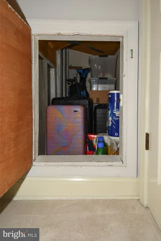 a bathroom with a sink and a mirror with toilet