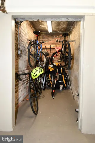 a view of a car parked in front of a building