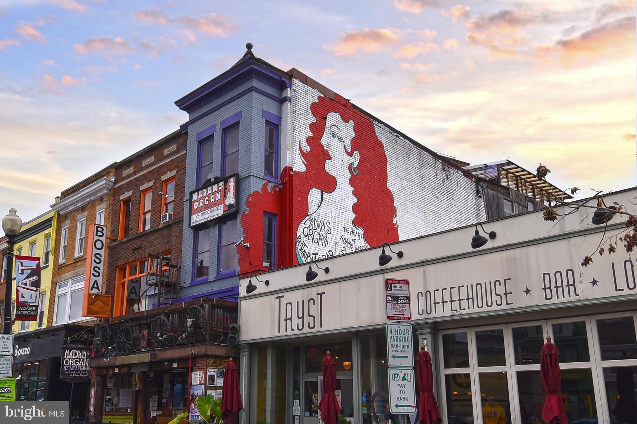 1731 Willard Street Northwest, Unit 105 Washington, DC 20009 - Photo 44 of 52 a view of a building with retail shops