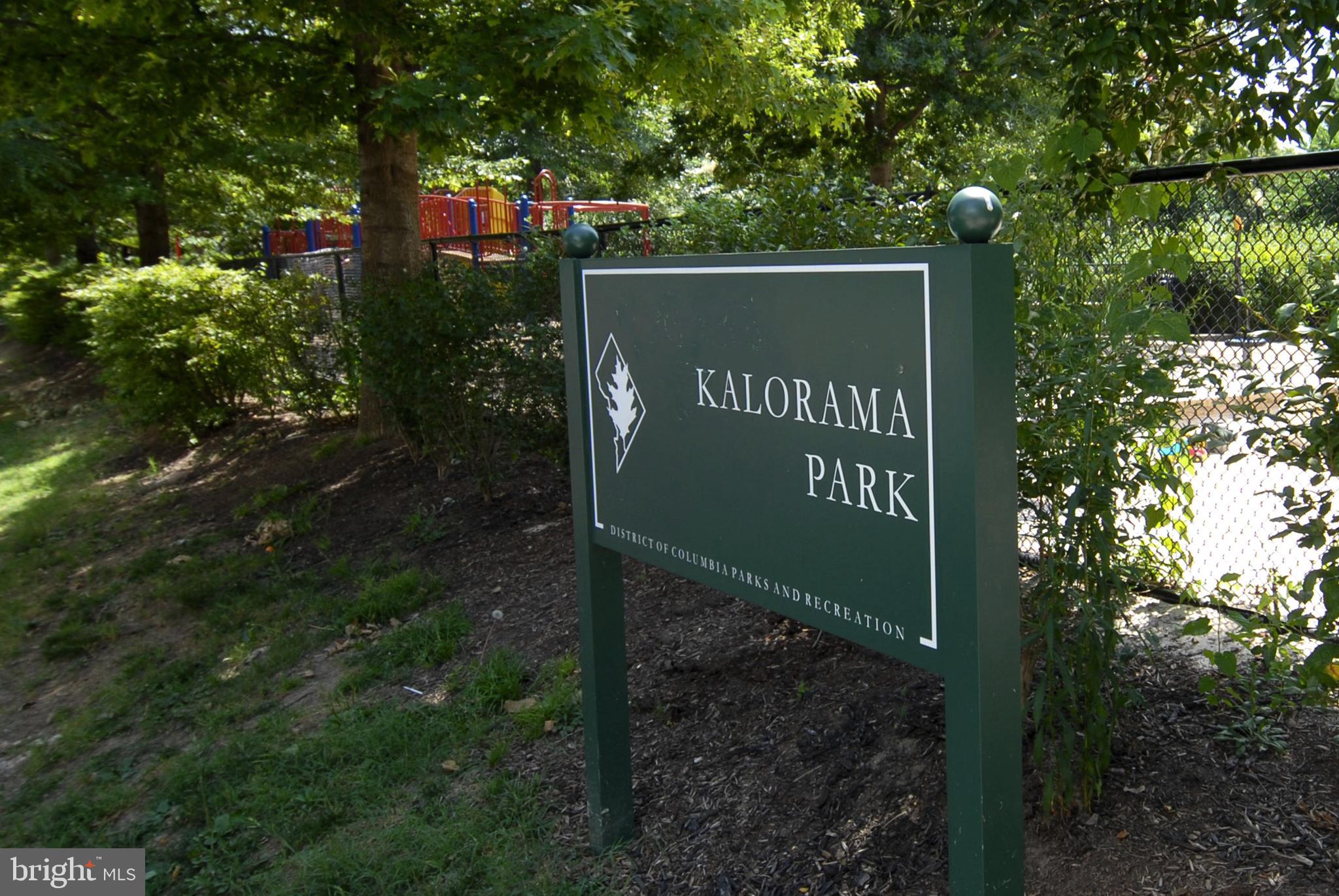 1731 Willard Street Northwest, Unit 105 Washington, DC 20009 - Photo 48 of 52 a sign that is sitting on a brick wall