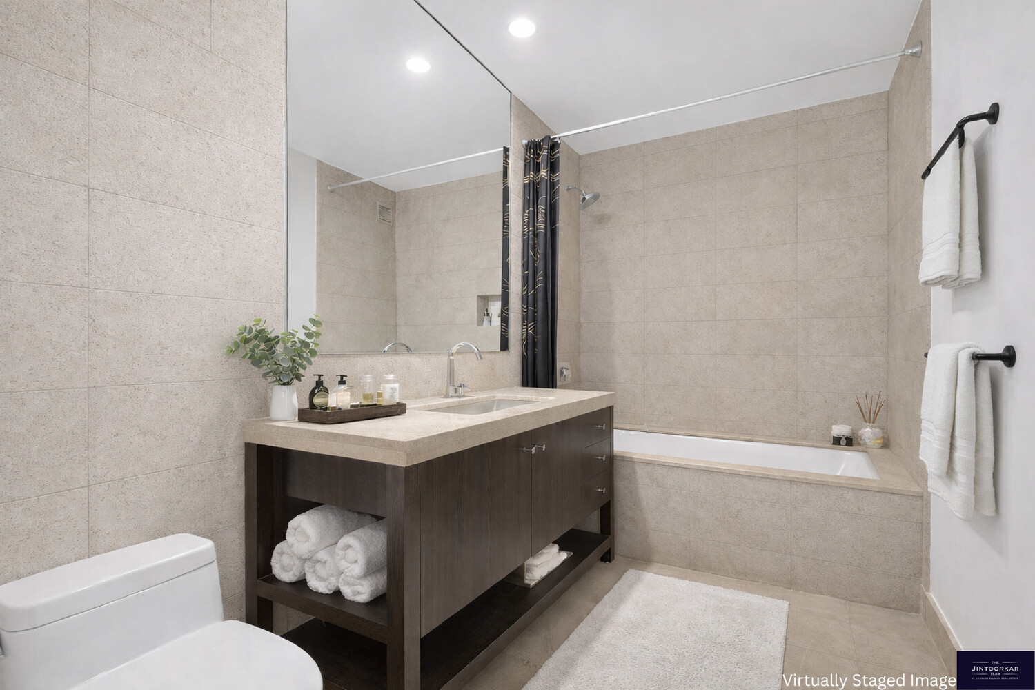 1600 Broadway, Unit 18D Manhattan, NY 10019 - Photo 2 of 5 a bathroom with a sink toilet and shower