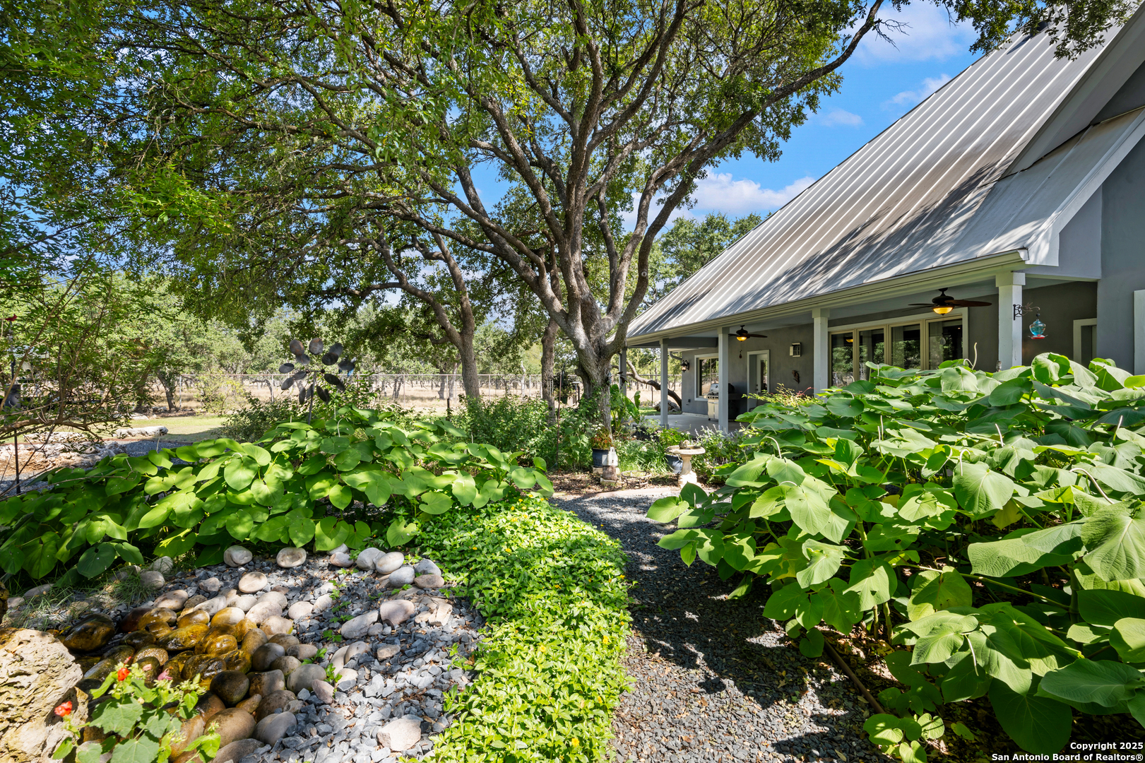 613 Saxet Trail Spring Branch, TX 78070 - Photo 30 of 41 a view of a house with a tree