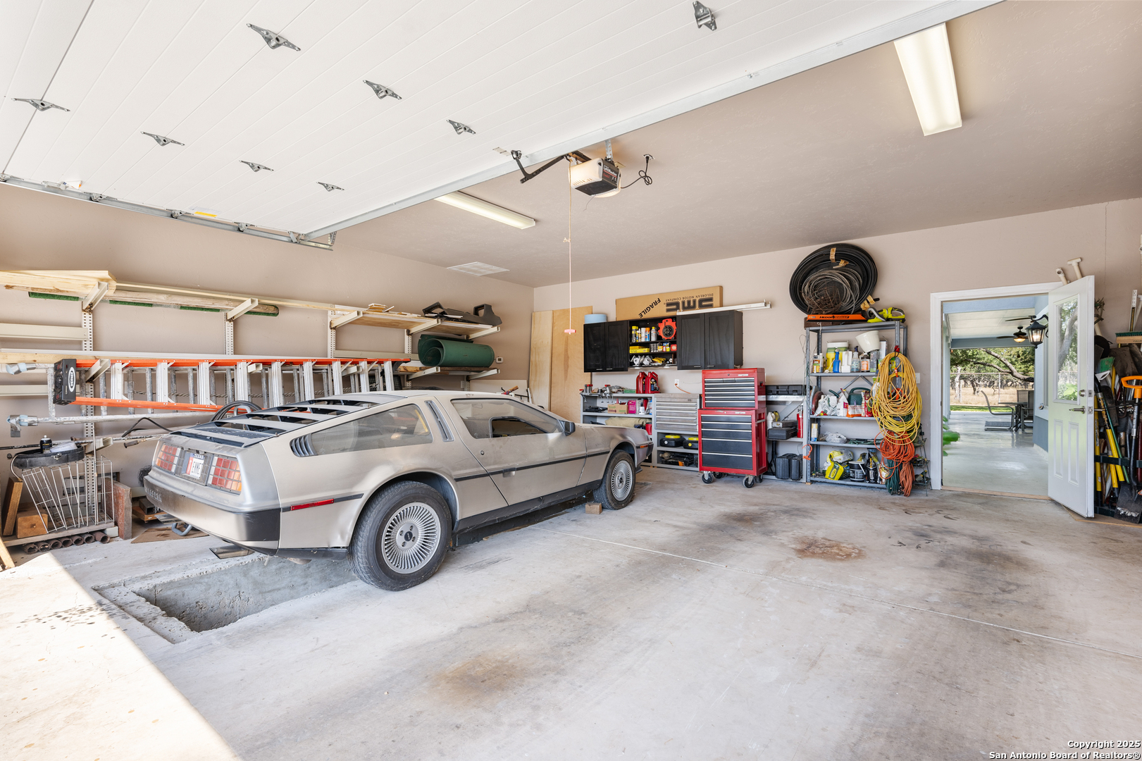 613 Saxet Trail Spring Branch, TX 78070 - Photo 33 of 41 a car in garage