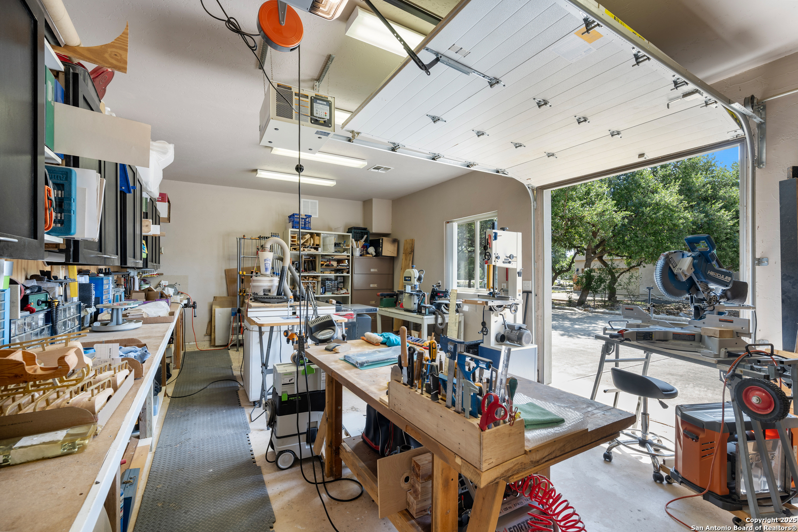 613 Saxet Trail Spring Branch, TX 78070 - Photo 34 of 41 a view of a dining room with lots of tables and chairs