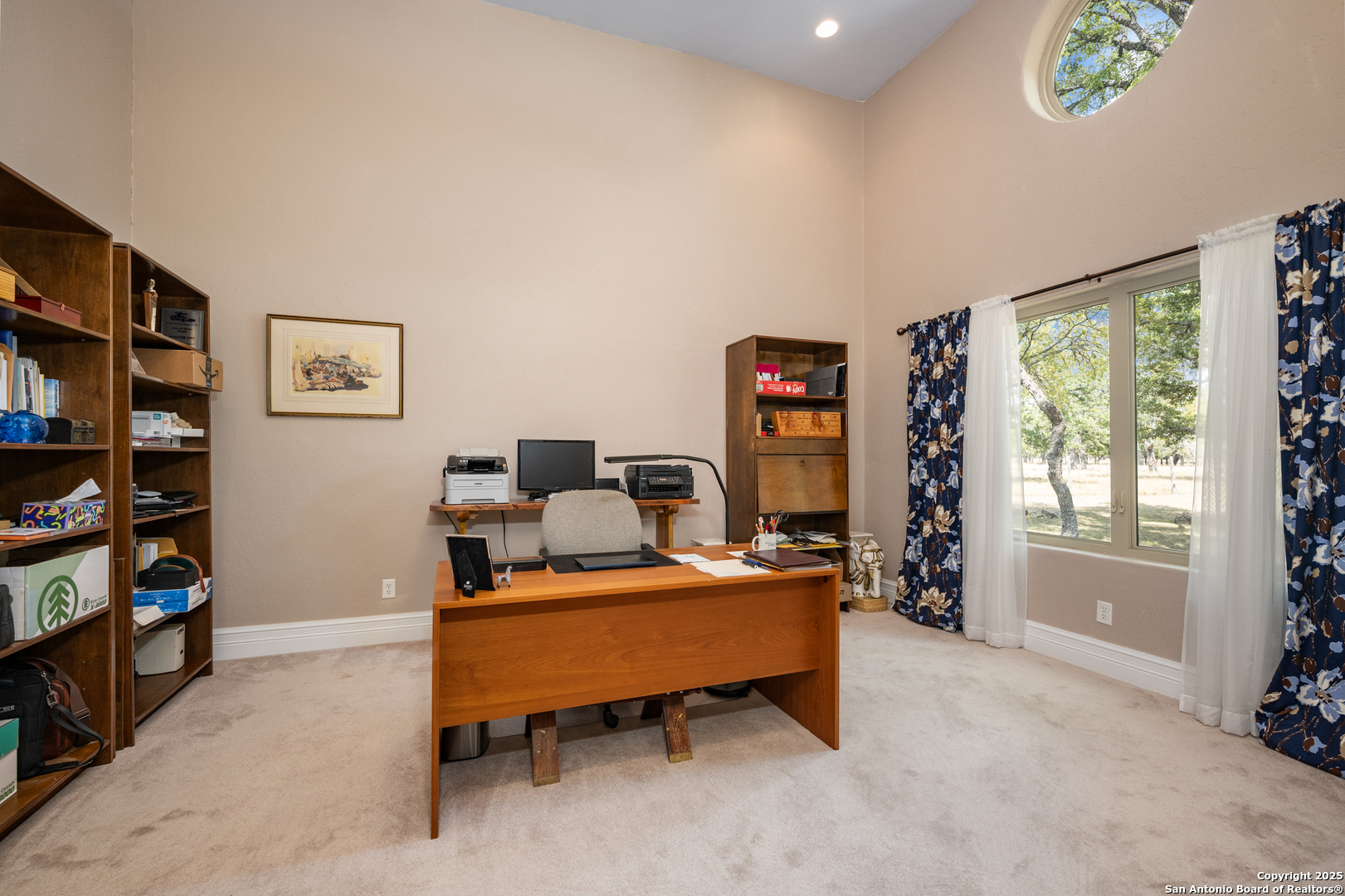 613 Saxet Trail Spring Branch, TX 78070 - Photo 10 of 41 a bedroom with furniture and a book shelf