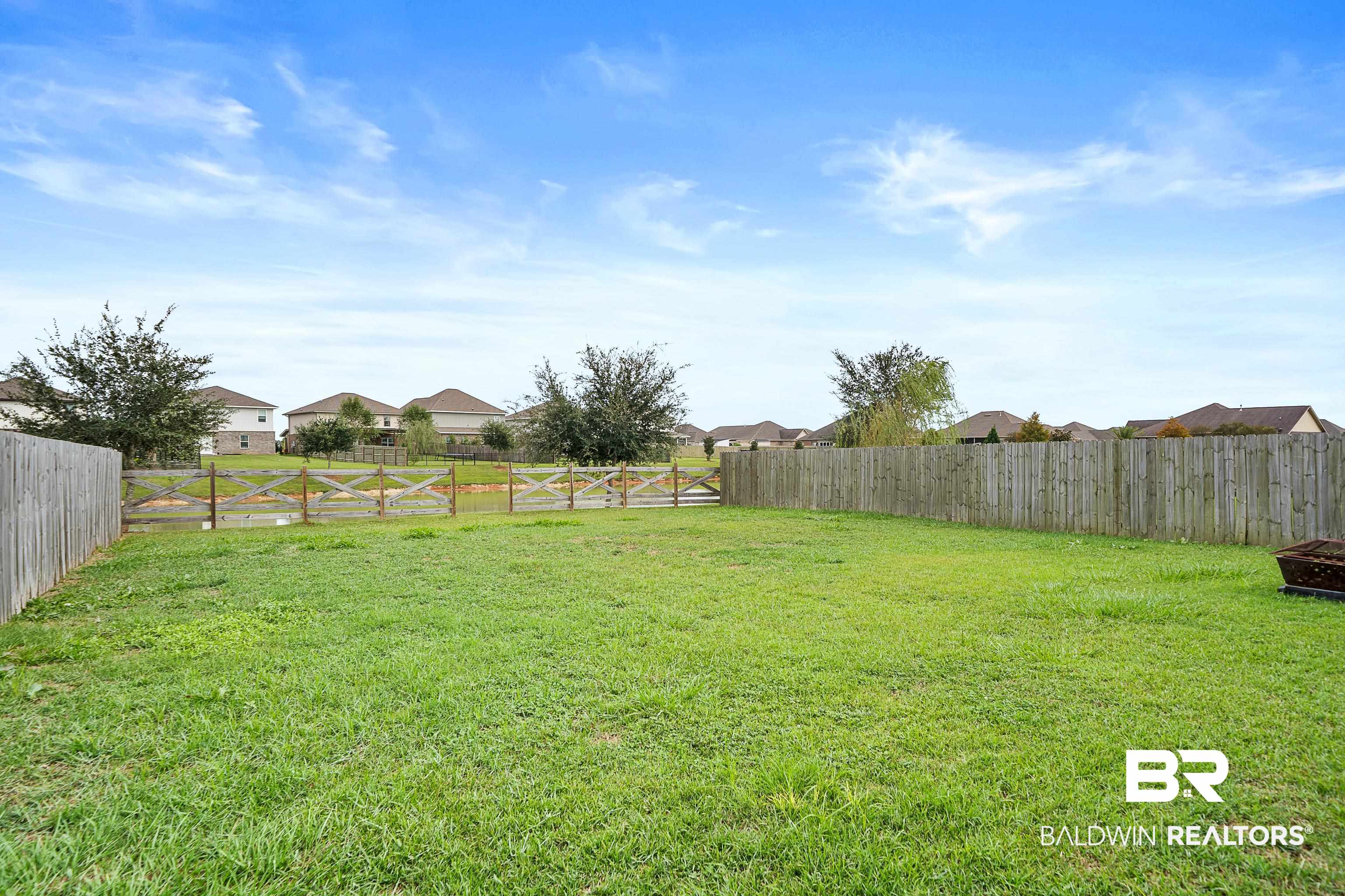 23916 Avernus Loop Daphne, AL 36526 - Photo 25 of 30 View of fenced backyard