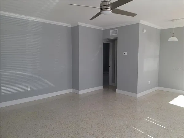 a bathroom with a shower a toilet and a sink
