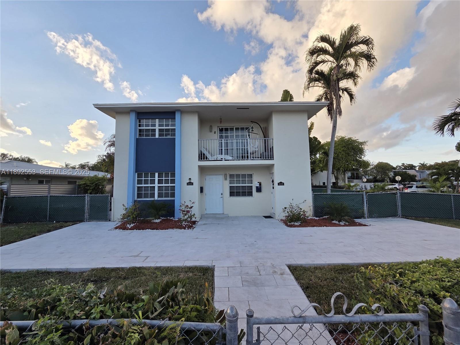 9100 Southwest 95th Avenue, Unit 9100 Miami, FL 33176 - Photo 24 of 37 a view of a house with a yard and potted plants