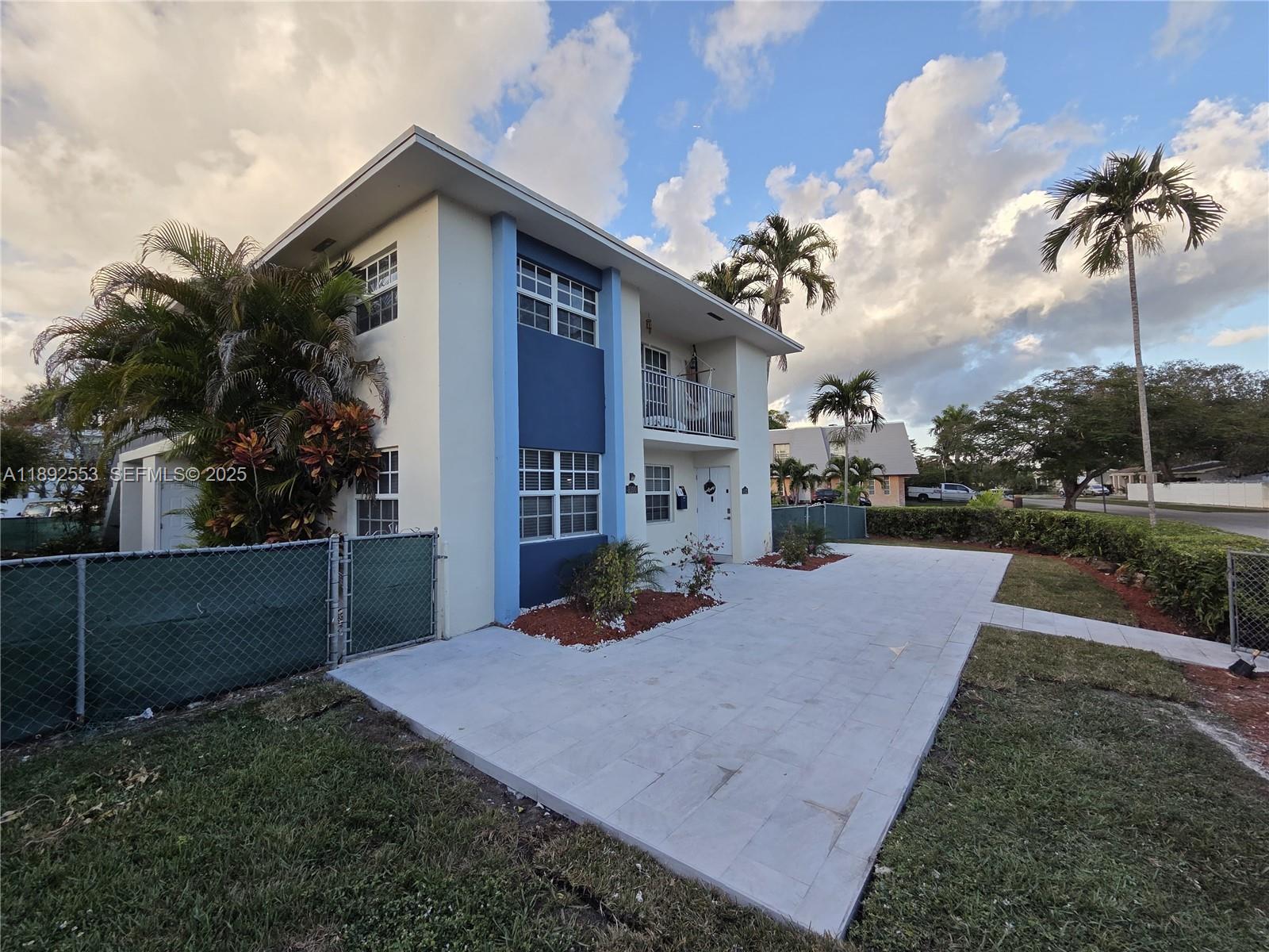 9100 Southwest 95th Avenue, Unit 9100 Miami, FL 33176 - Photo 36 of 37 a view of a house with backyard and porch