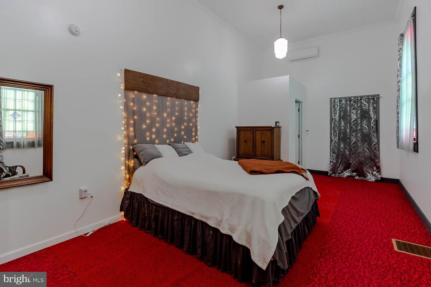 1070 Valley View Road Bellefonte, PA 16823 - Photo 14 of 52 a bedroom with a bed and a window