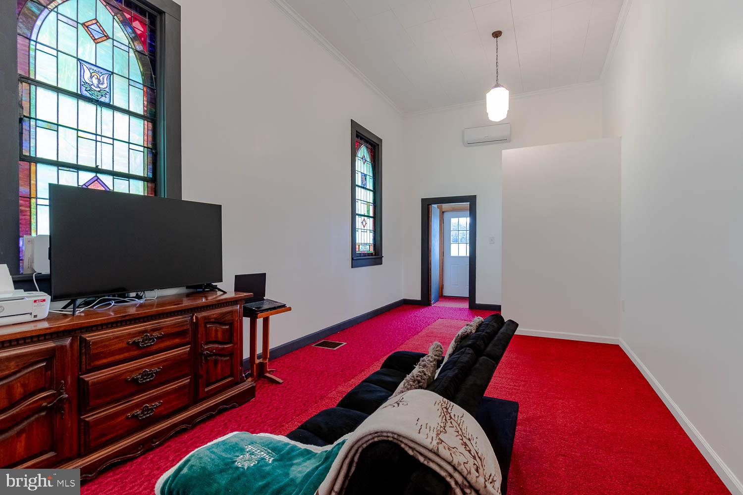 1070 Valley View Road Bellefonte, PA 16823 - Photo 17 of 52 a bedroom with a bed and a flat screen tv