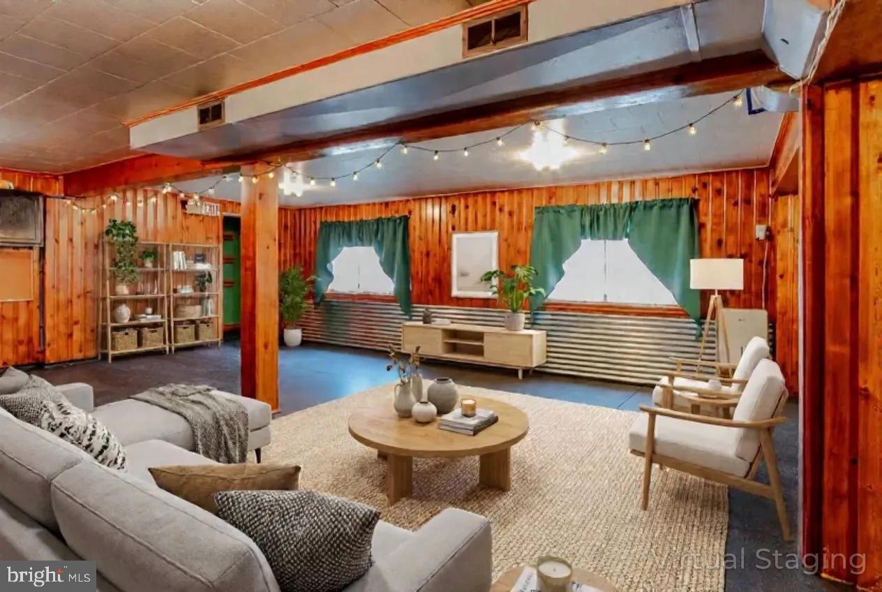 1070 Valley View Road Bellefonte, PA 16823 - Photo 25 of 52 a living room with furniture and a large window