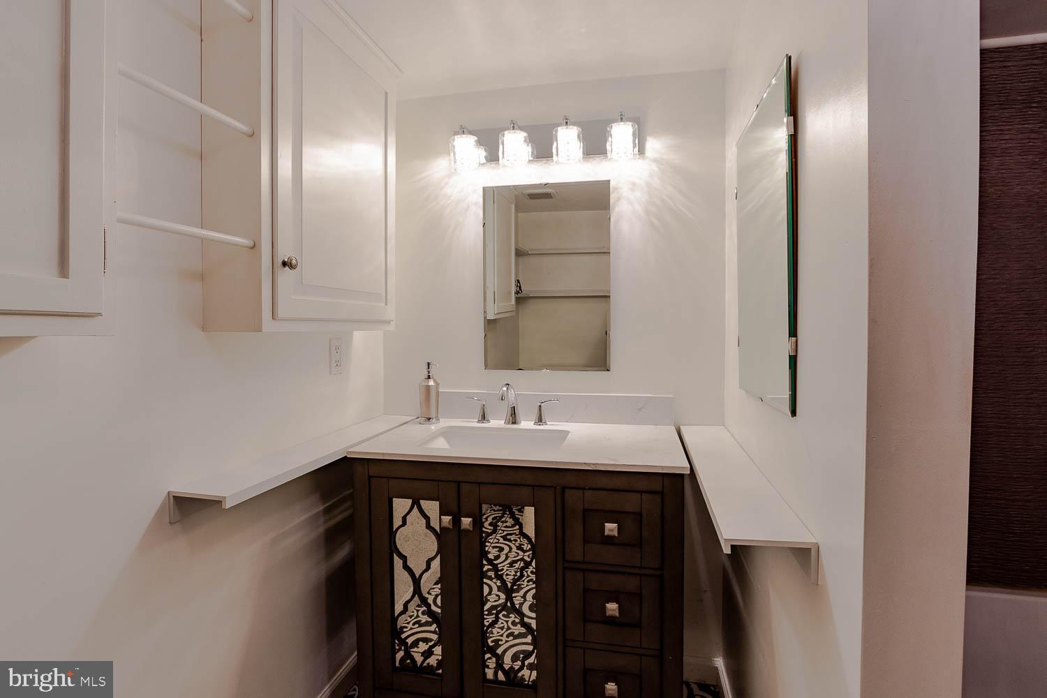 1070 Valley View Road Bellefonte, PA 16823 - Photo 34 of 52 a bathroom with a sink and a mirror