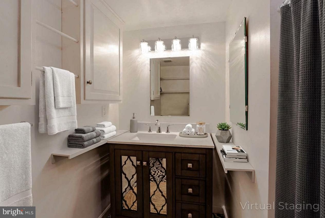 1070 Valley View Road Bellefonte, PA 16823 - Photo 35 of 52 a bathroom with a sink and a mirror