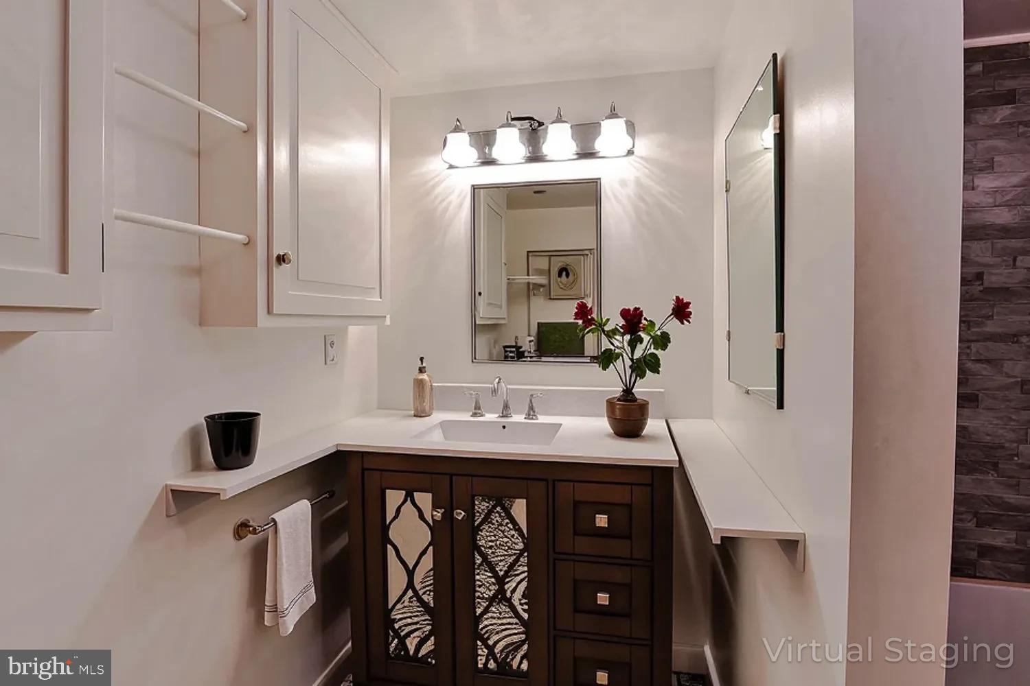1070 Valley View Road Bellefonte, PA 16823 - Photo 36 of 52 a bathroom with a sink and a mirror