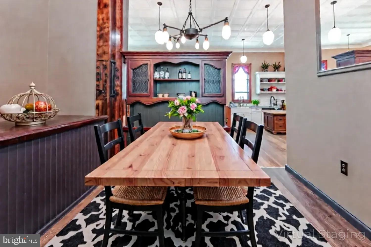 1070 Valley View Road Bellefonte, PA 16823 - Photo 10 of 52 a view of a dining room with furniture and wooden floor