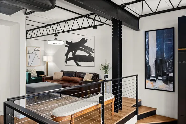 a view of staircase with a rug