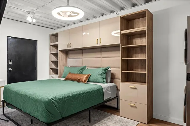 a bedroom with a bed and closet