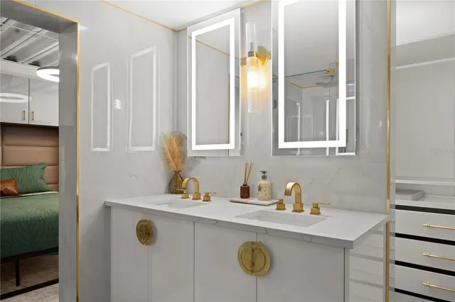 a kitchen with a sink and a refrigerator