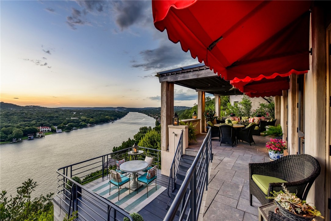 3604 Mt Bonnell Road Austin, TX 78731 - Photo 1 of 1 a view of a balcony with chairs and a potted plant