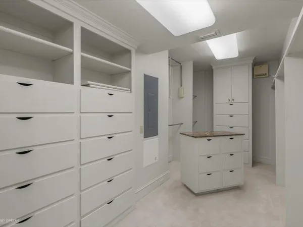 a view of an empty walk in closet