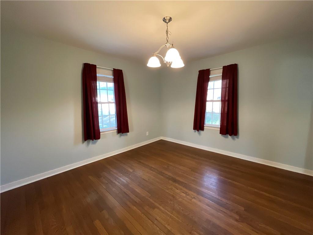 809 Locust Avenue Washington, PA 15301 - Photo 15 of 27 a view of an empty room with wooden floor and windows
