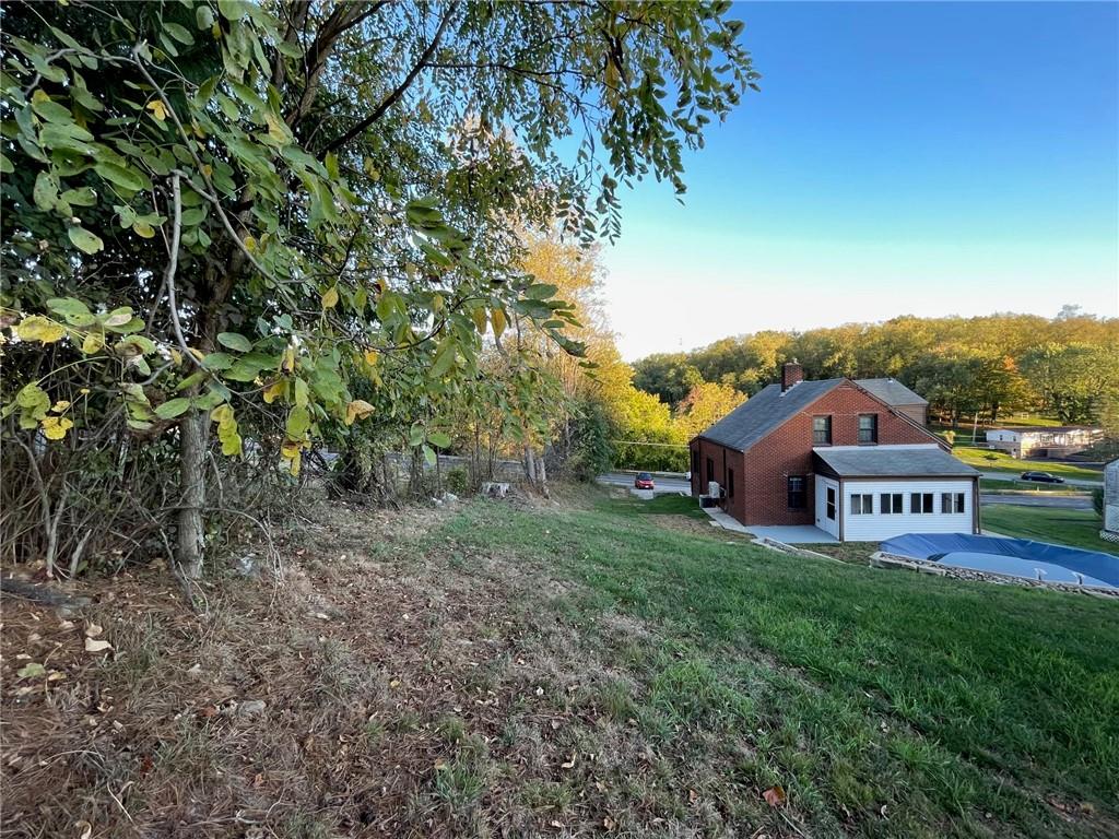 809 Locust Avenue Washington, PA 15301 - Photo 27 of 27 a view of a house with a yard