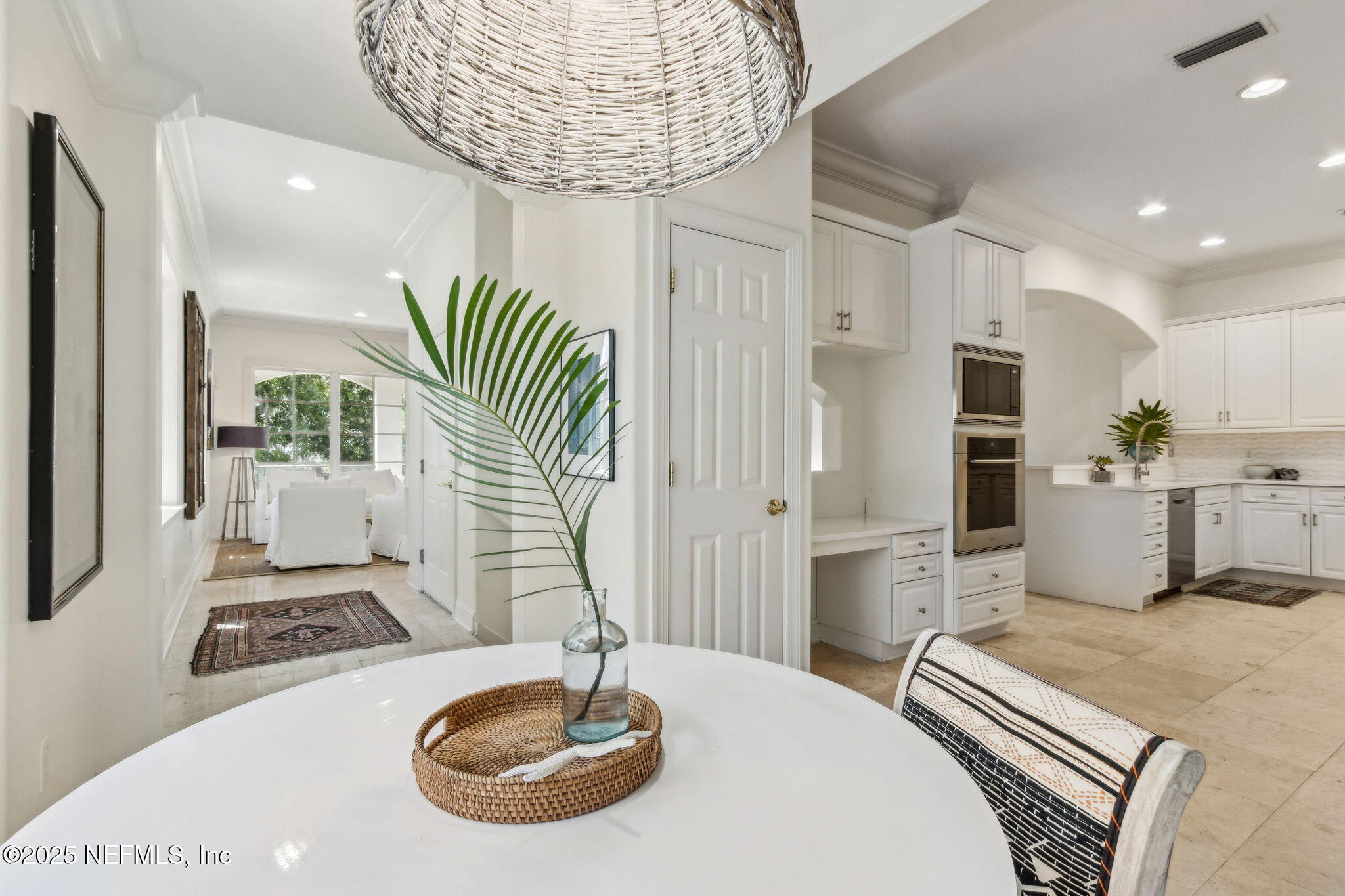 95032 Spring Tide Lane Fernandina Beach, FL 32034 - Photo 20 of 50 a kitchen with a table and chairs