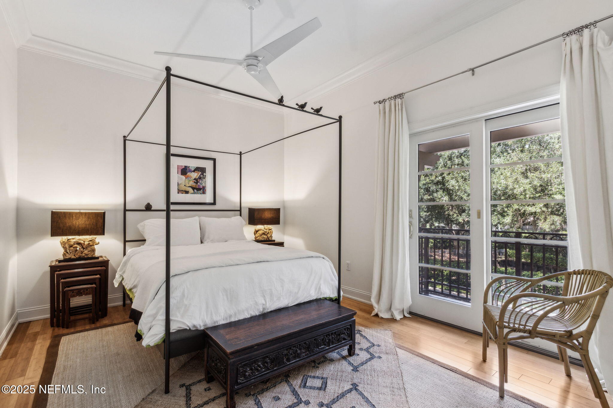 95032 Spring Tide Lane Fernandina Beach, FL 32034 - Photo 21 of 50 a bedroom with a bed next to a window