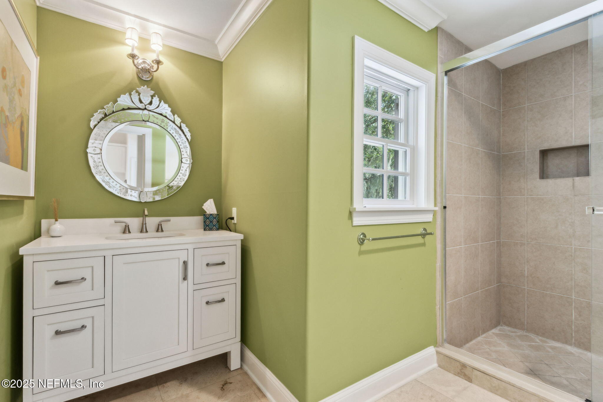 95032 Spring Tide Lane Fernandina Beach, FL 32034 - Photo 24 of 50 a bathroom with a sink a toilet and a mirror