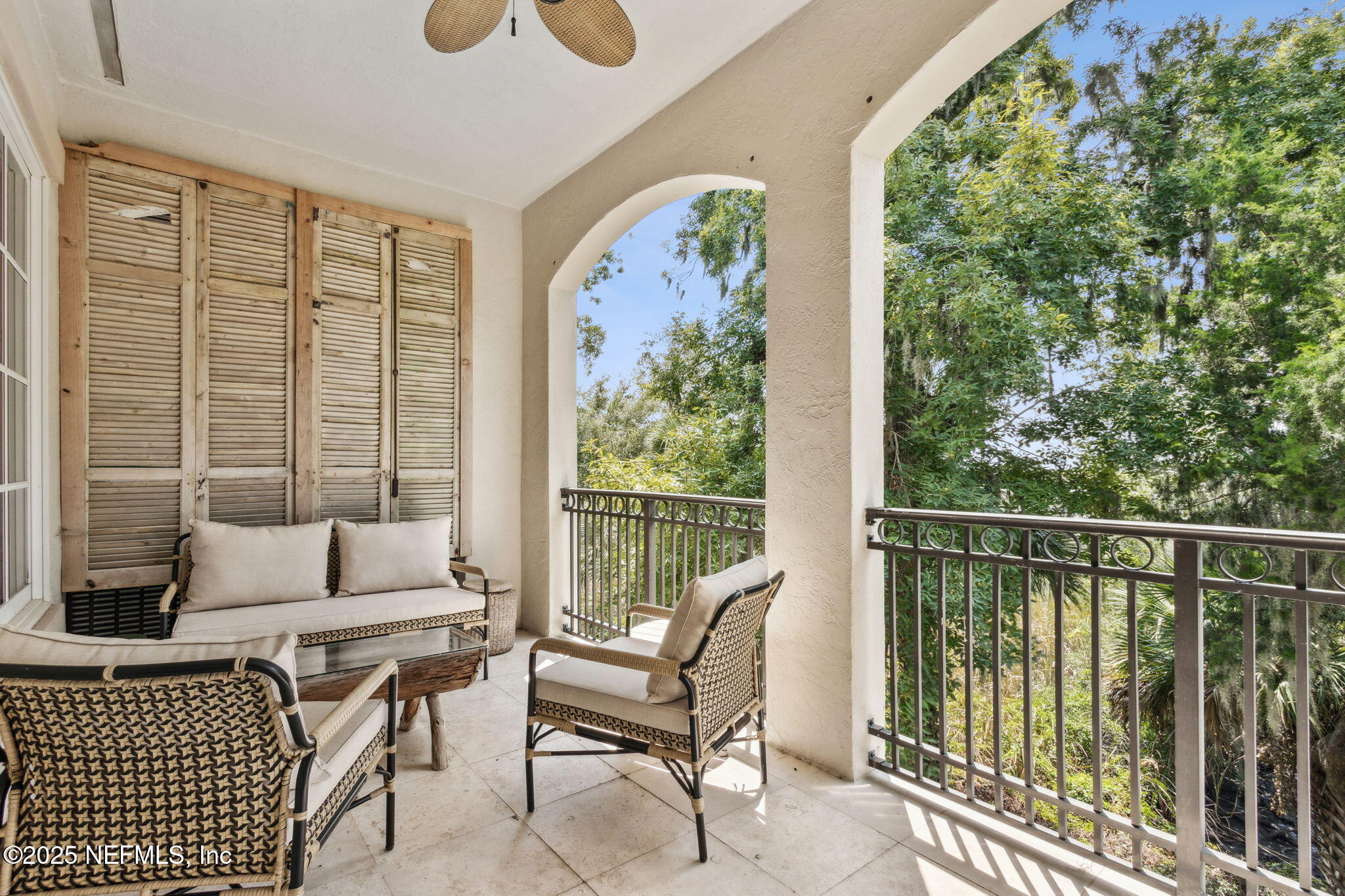 95032 Spring Tide Lane Fernandina Beach, FL 32034 - Photo 3 of 50 a living room with furniture and a floor to ceiling window