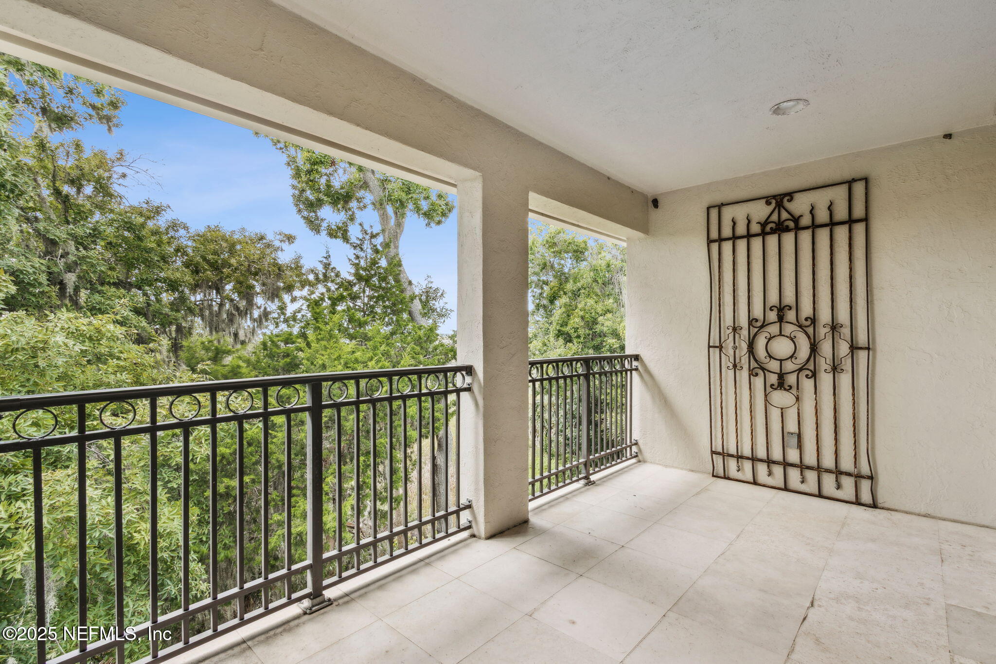 95032 Spring Tide Lane Fernandina Beach, FL 32034 - Photo 34 of 50 a view of a porch with a wooden floor