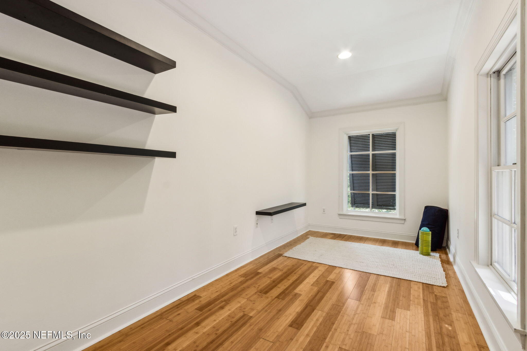 95032 Spring Tide Lane Fernandina Beach, FL 32034 - Photo 35 of 50 wooden floor in an empty room with a window
