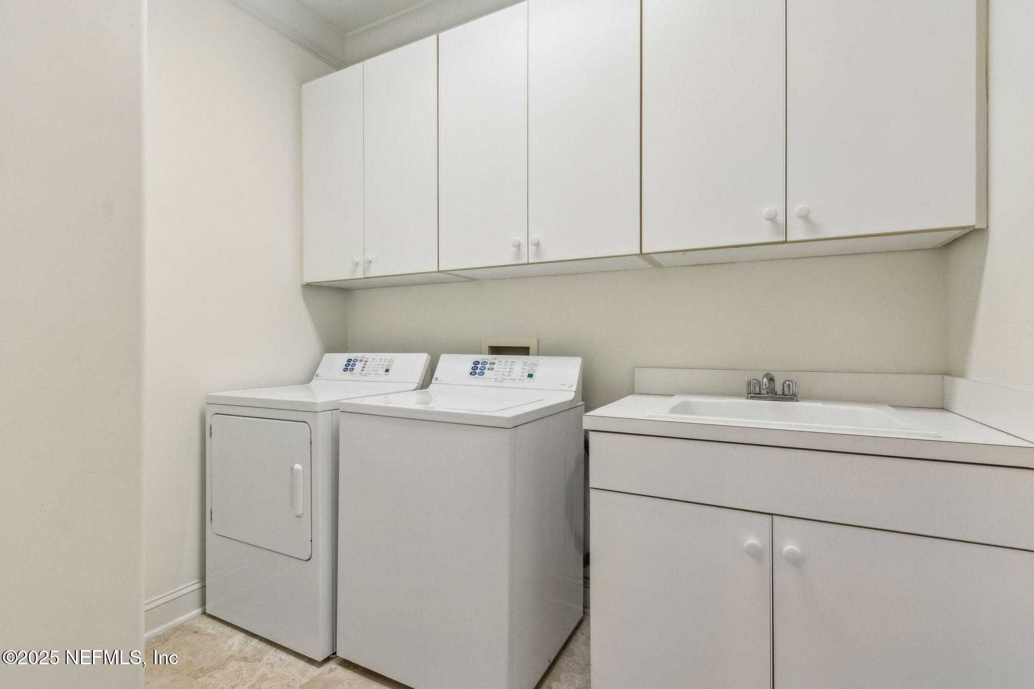 95032 Spring Tide Lane Fernandina Beach, FL 32034 - Photo 40 of 50 a utility room with dryer and washer