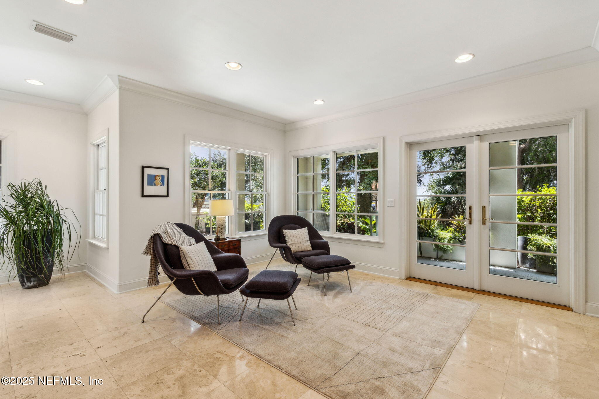 95032 Spring Tide Lane Fernandina Beach, FL 32034 - Photo 43 of 50 a living room with furniture and large windows