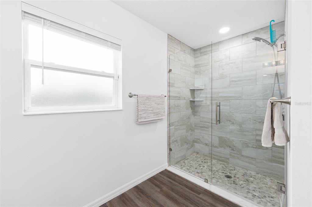 8381 North Wayside Avenue Dunnellon, FL 34433 - Photo 15 of 37 a bathroom with a shower