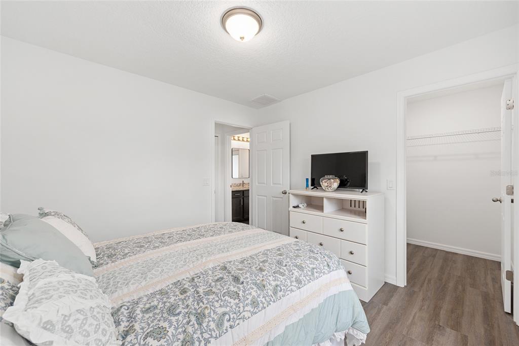 8381 North Wayside Avenue Dunnellon, FL 34433 - Photo 21 of 37 a bedroom with a bed and a television