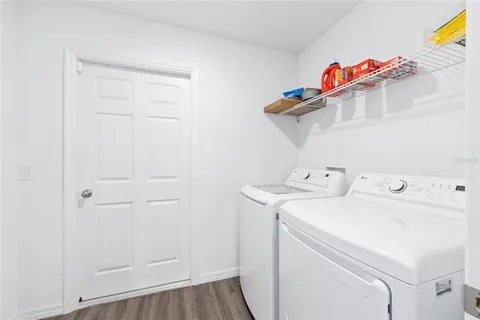 a utility room with dryer and washer