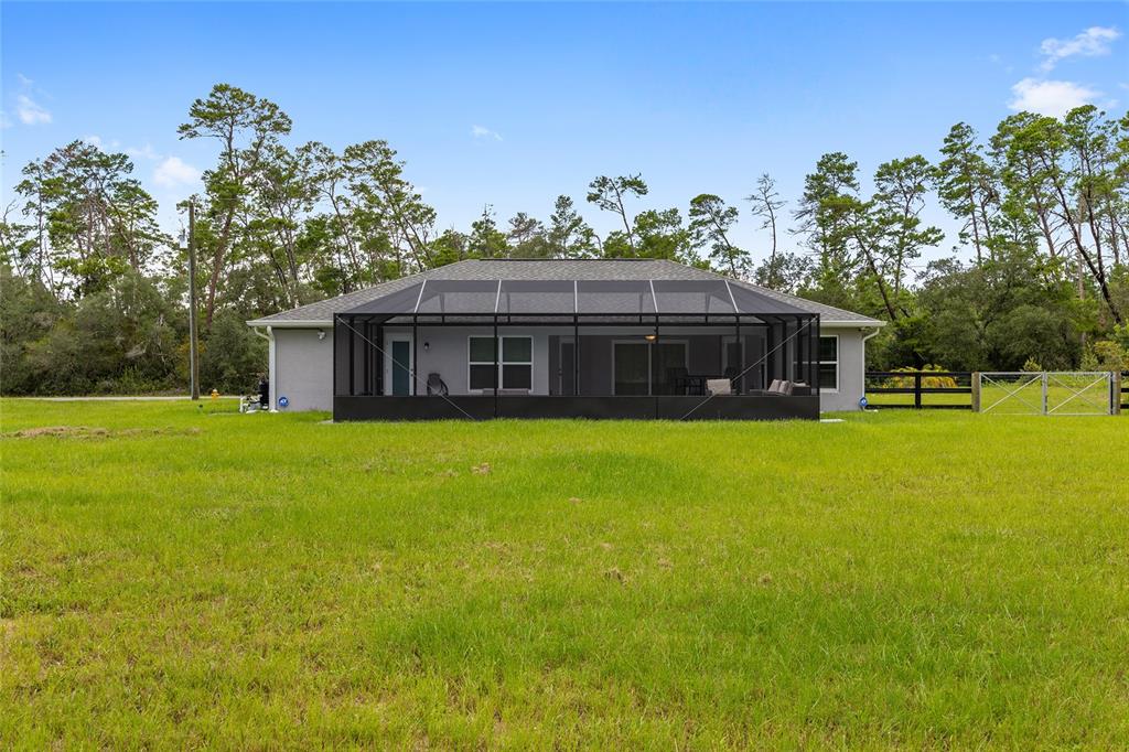 8381 North Wayside Avenue Dunnellon, FL 34433 - Photo 34 of 37 a house view with a garden space