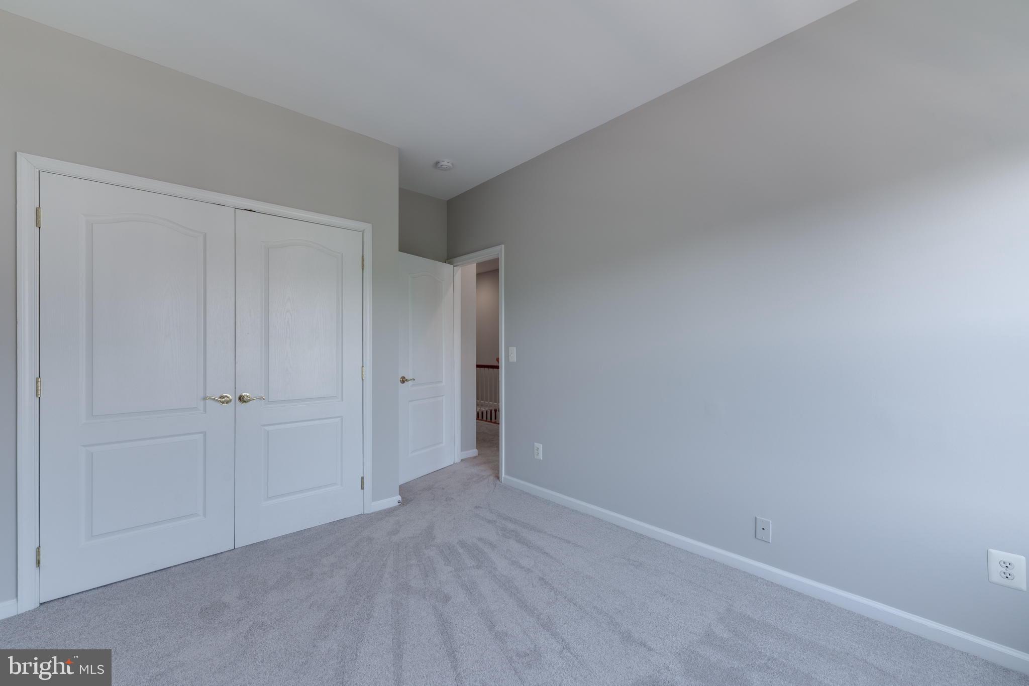 42429 Redstone Terrace Brambleton, VA 20148 - Photo 27 of 35 a view of an empty room